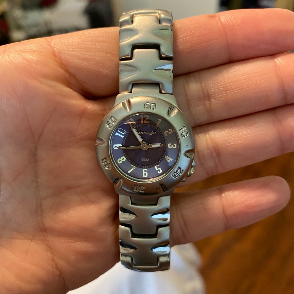 Silver Fossil watch with purple dial
